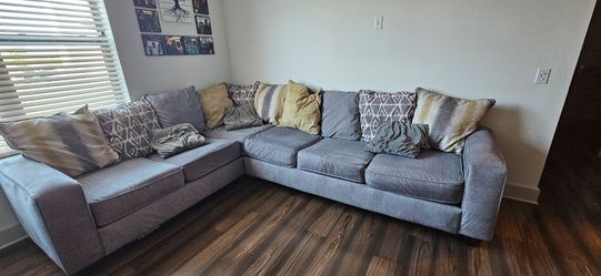 Oversized Grey Sectional with Pull Out Mattress
