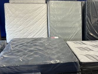 New Mattresses in Plastic Wrap