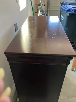 A solid wood dresser
