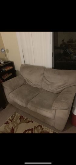 Tan loveseat sofa