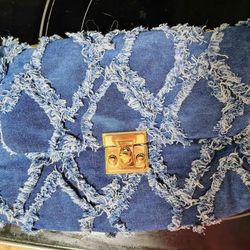 Distressed denim handbag