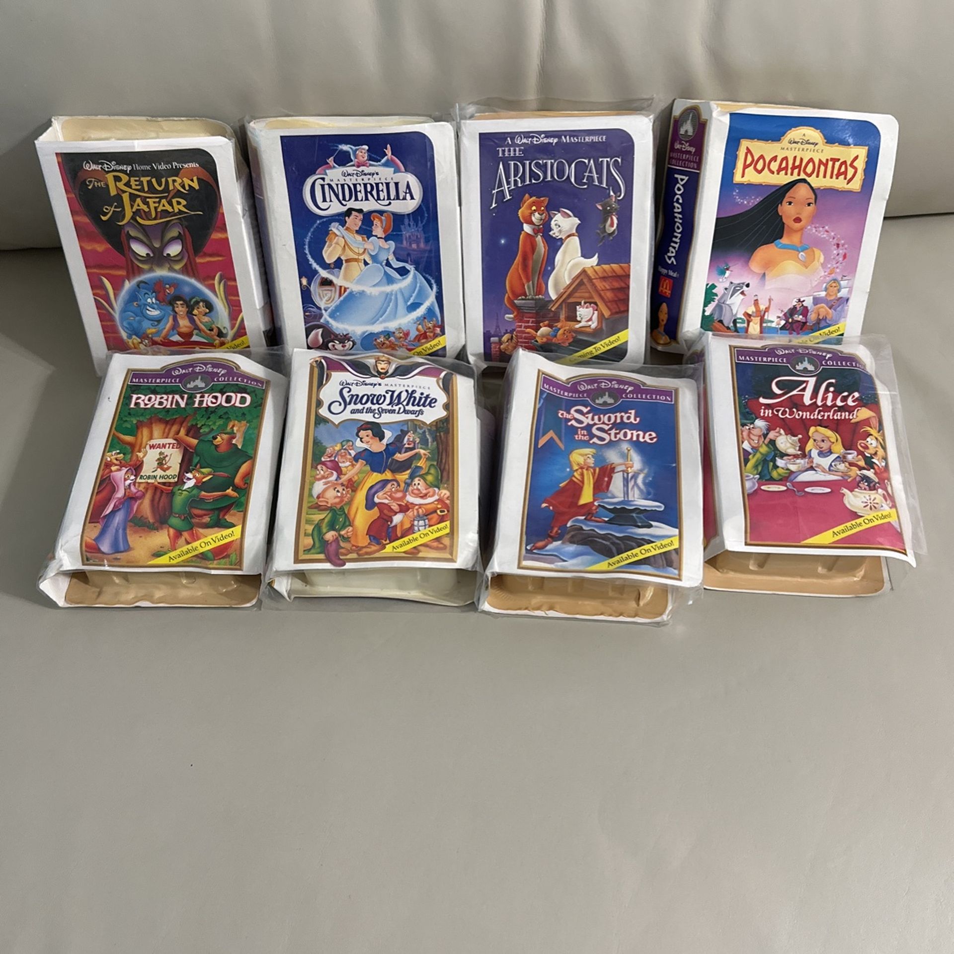 Rare 1995 McDonalds happy meal toys of Disney VHS promotional movies.