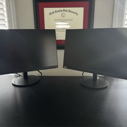 Dual monitor setup with Lenovo ThinkVision monitors and docking station