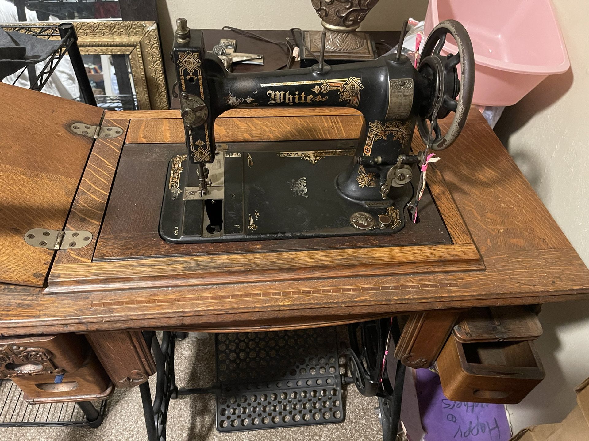 Antique white sewing machine