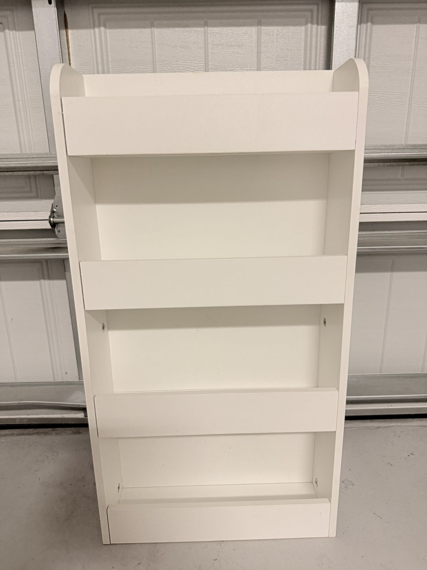 Selling wooden magazine rack, 29.5” tall.