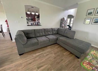 Gray sectional couch with chaise