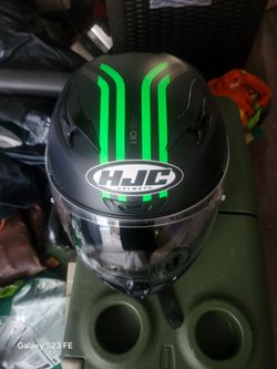 Two helmets  sling shot luggage bags