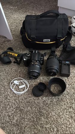 Nikon D60 and extra lenses with case and battery charger