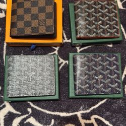 Louis Vuitton And E Goyard Wallets