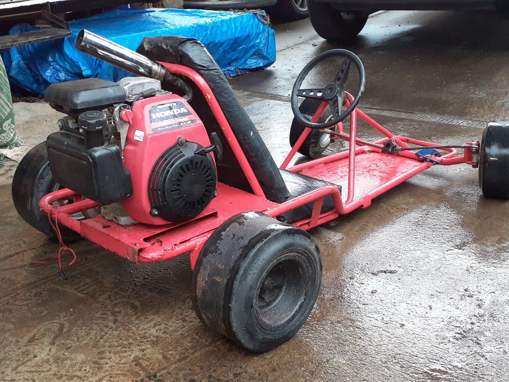 Honda Go kart needs little work but engine runs awesome make me and offer willing to make some deals ......