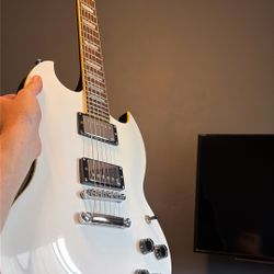 White ASG Six String Guitar. 