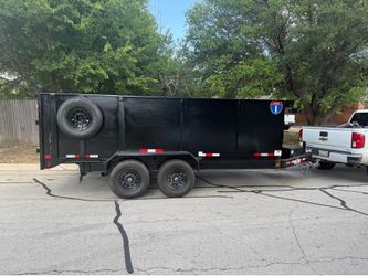 Dump trailer with ramps