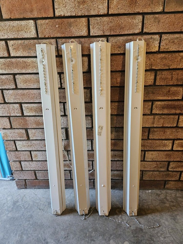 Florescent Lights With Chain Hangers And 4 Bulbs. 4 Feet In Length. $20 Takes It All.
