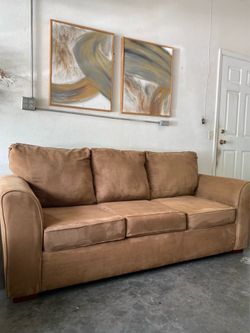 Comfortables three-seater sofa in excellent condition,