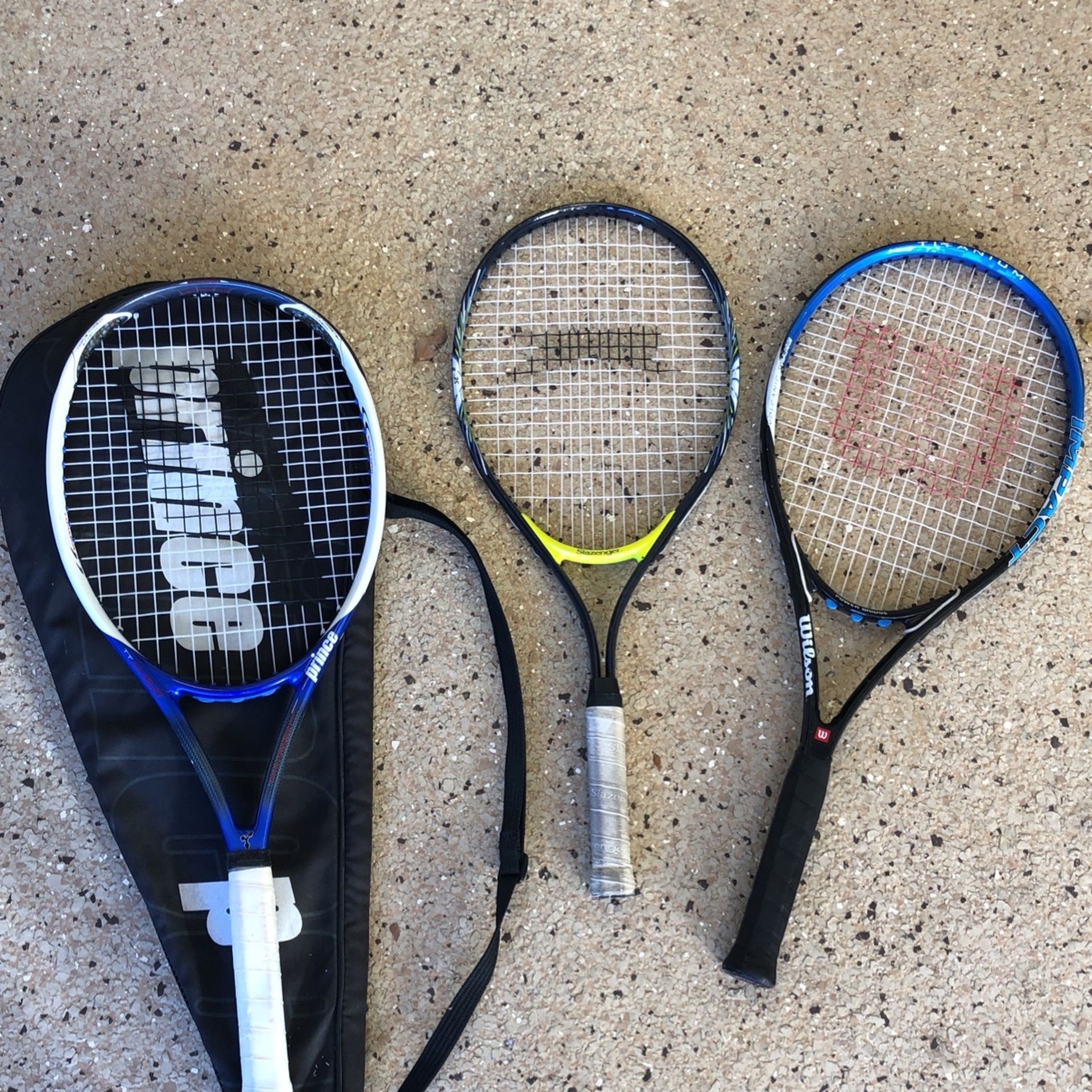 Three Tennis Rackets