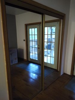 Sliding Mirrored Glass Closet Doors
