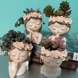 Girl Planters With Succulents 