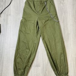 Green high waist joggers with chains details. K