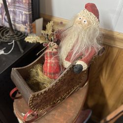 Resin Paper Mache Santa With Aged Soft Leather Sleigh