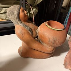 Native design clay art with pot