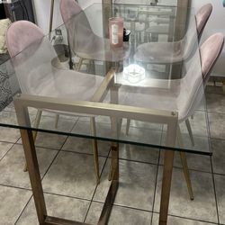 Glass table with chairs