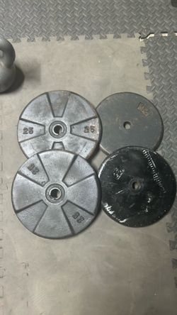 Four 25lb plates