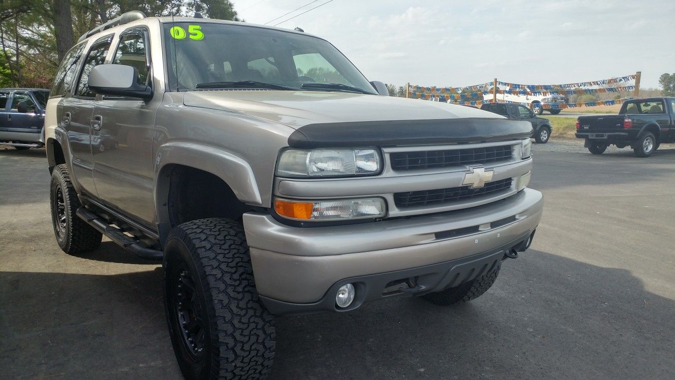 JACKED UP 05 CHEVY TAHOE LTZ WITH 115K