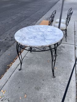 Marble table with chairs