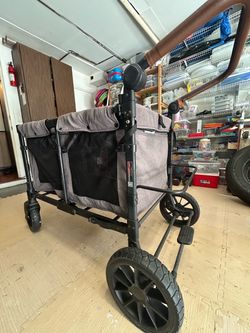 WonderFold W4 4-Seater Stroller Wagon – $275