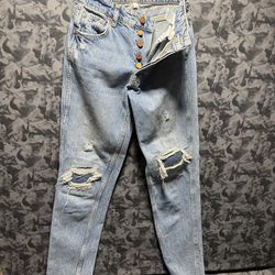 Anine Bing Lara Ripped Frayed Hem Kick Flare Jeans Women's 24  The product is a pair of Anine Bing Lara Ripped Frayed Hem Kick Flare Jeans in women's 