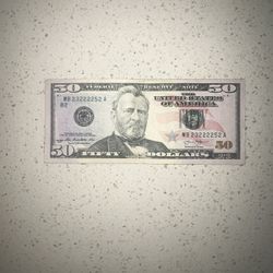 50 dollar bill almost solid serial number