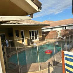 Beige pool fencing with gate 1044 total feet