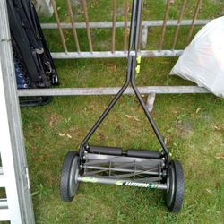 Earthiness Mower Bately Used. Like New