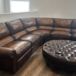 Reclinable Leather sectional w/ Ottoman 