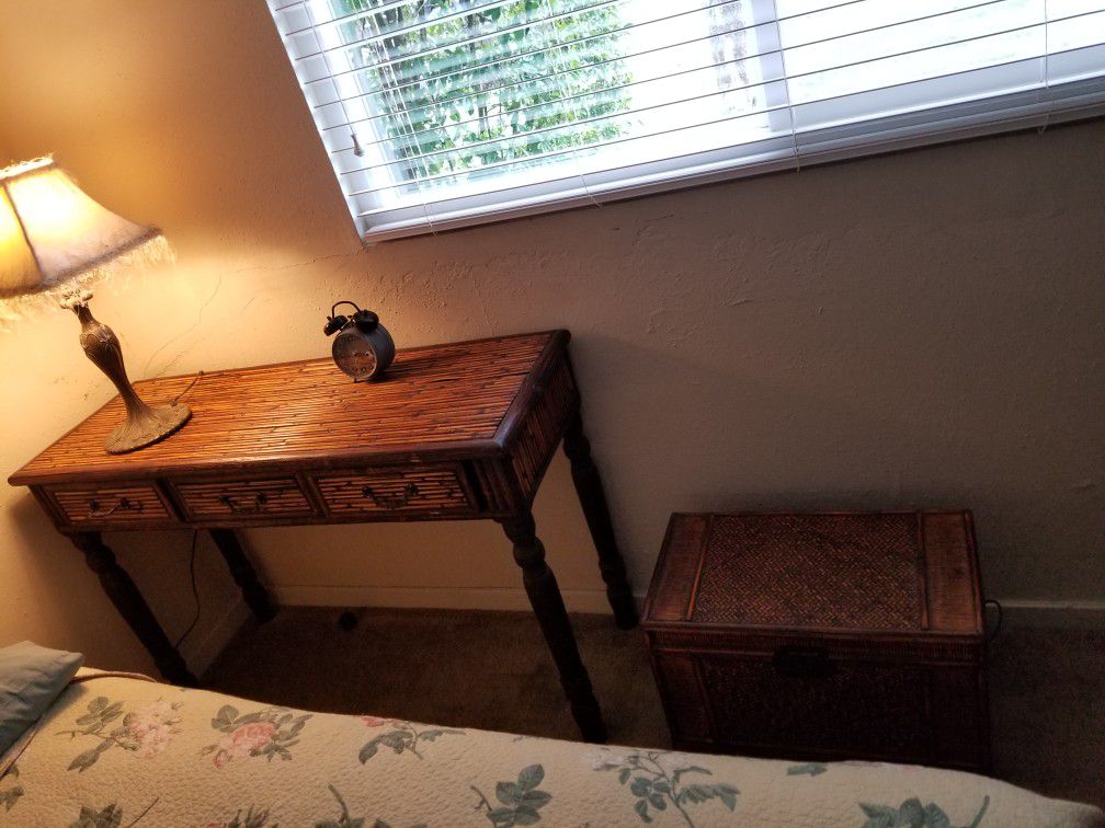 Console table and two other trunks