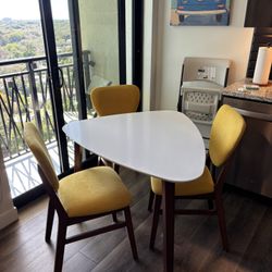 Modern White Dining Table with Mustard Chairs (4-Piece Set)