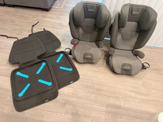 Two NUNA AACE Booster Seats PLUS two munchkin brand car seat protectors ***MUST SELL*** $350