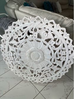 Round wooden artwork. 40 by 40