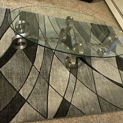 GLASS COFFEE TABLE AND RUG FOR SALE.