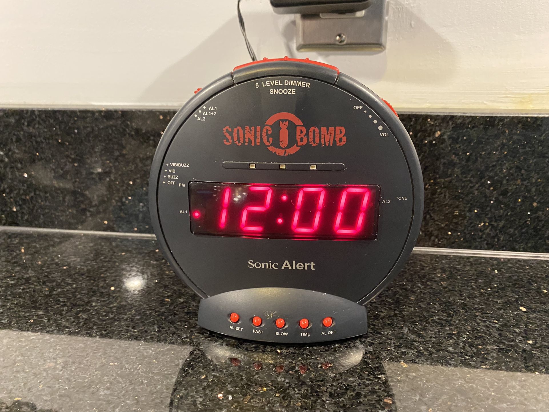 Sonic Bomb Alarm Clock that blasts a 113db alarm and flashes lights.