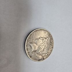 1923 LIBERTY SILVER DOLLAR.