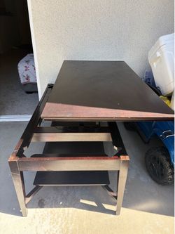 Coffee table lift up to table.