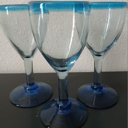 SET OF 3 MEXICAN HANDBLOWN WINE GLASSES 
TURQUOISE BLUE RIM 
$10
Pick up Mckinney