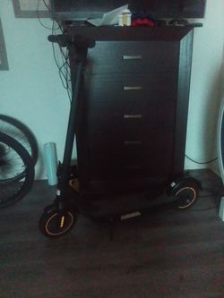 Black Electric Scooter with Gold Wheels