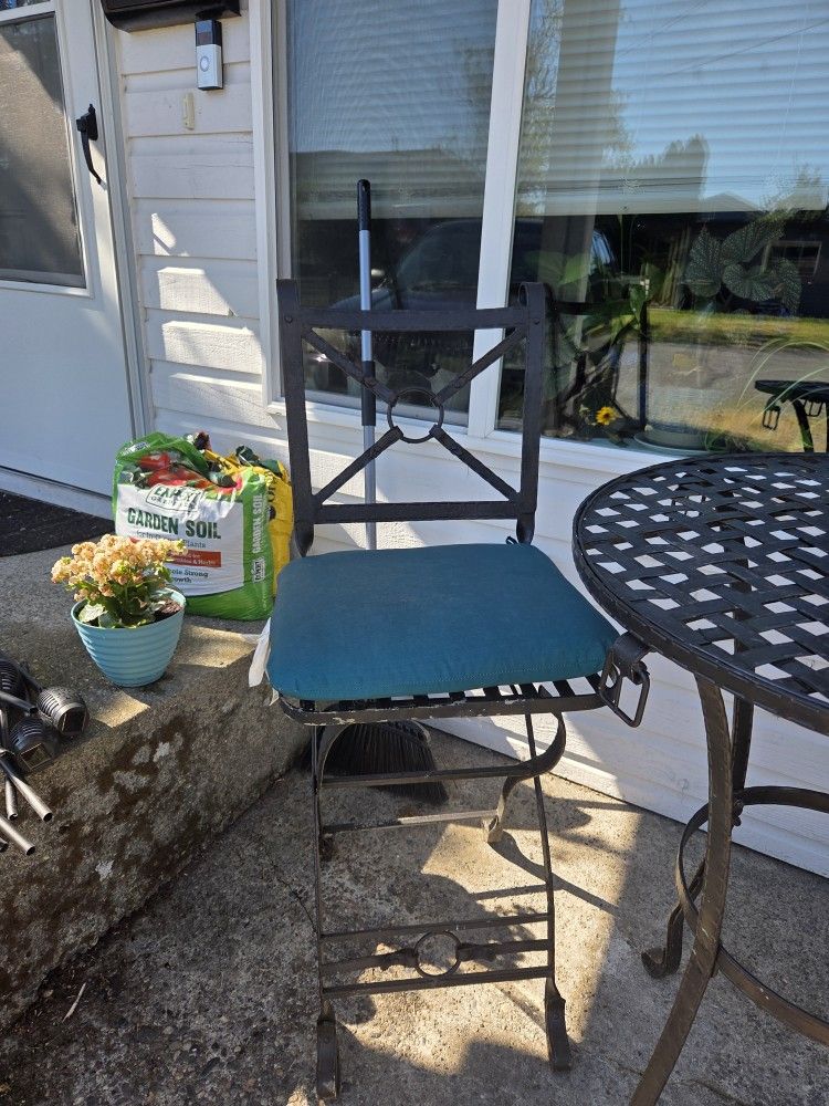 Wrought Iron Table And Chairs