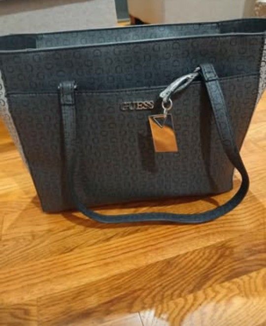 Brand new with tag black Guess purse/bag