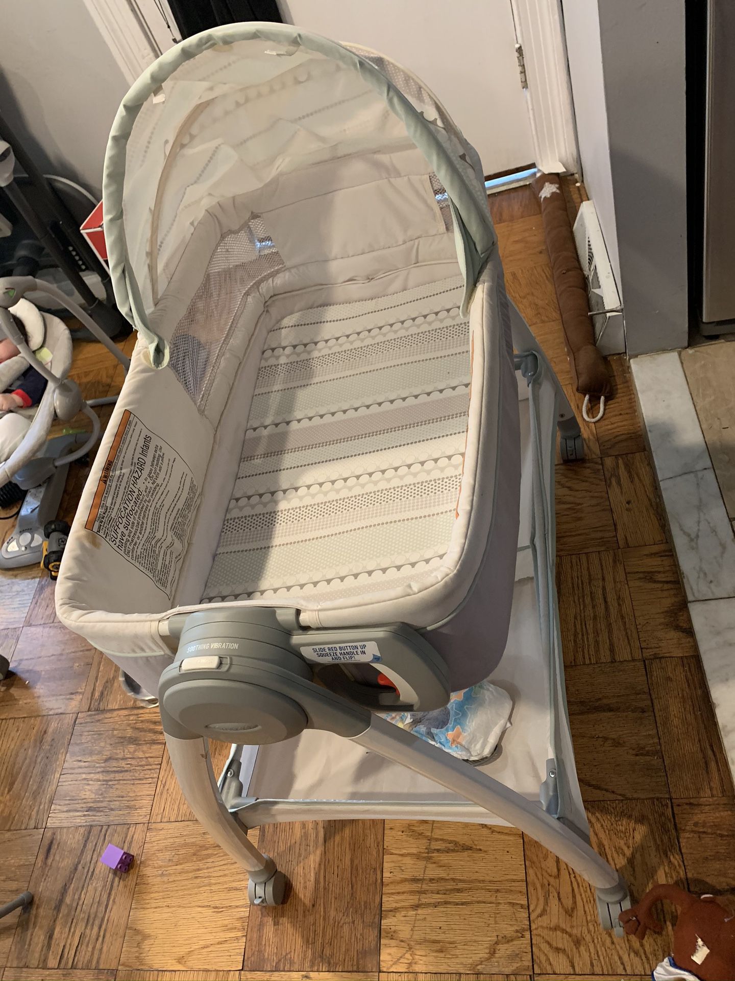 Convertable bassinet and diaper changing table