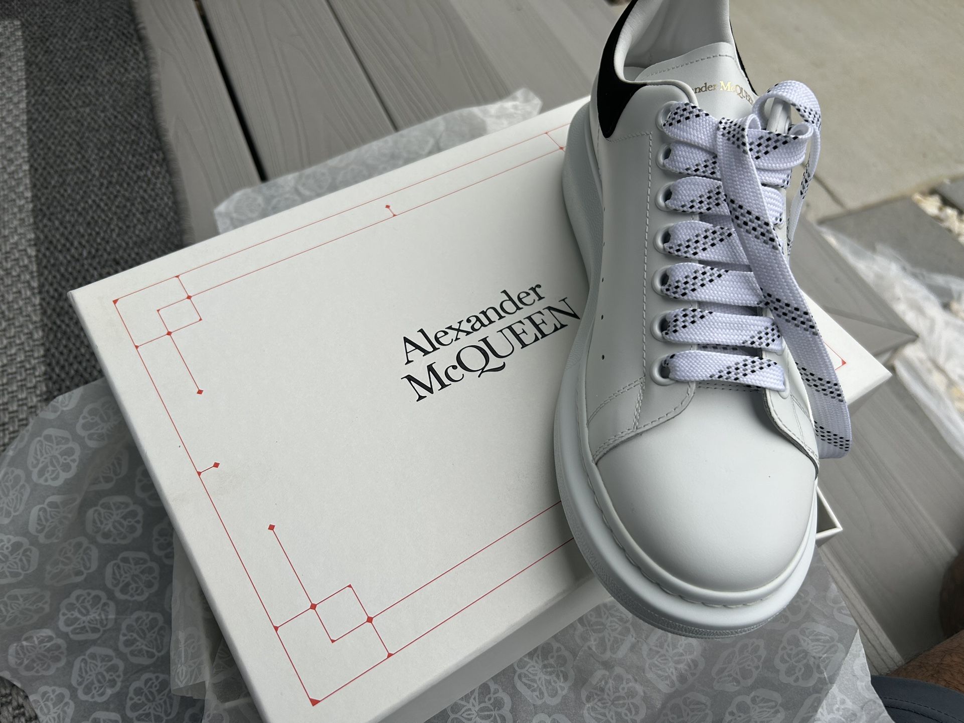 Alexander McQueen white and black trainers