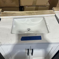 30” Bathroom Vanity in white , single sink soft close solid wood with vanity top in white  $485 Luke’s liquidations warehouse Address:  2434 N Forsyth