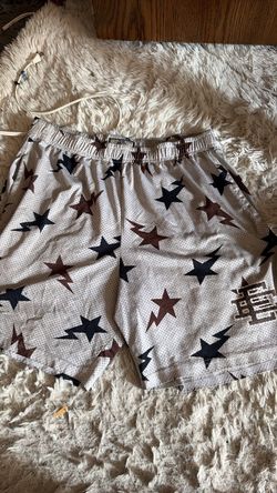 White Mesh Shorts with Star and Lightning Bolt Print